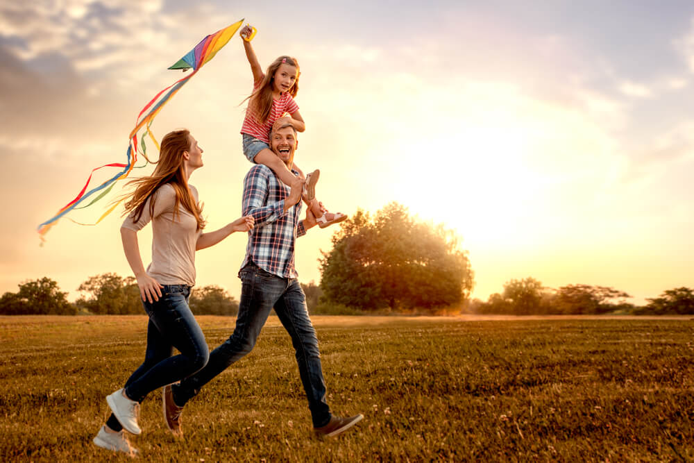 Family flying a kite