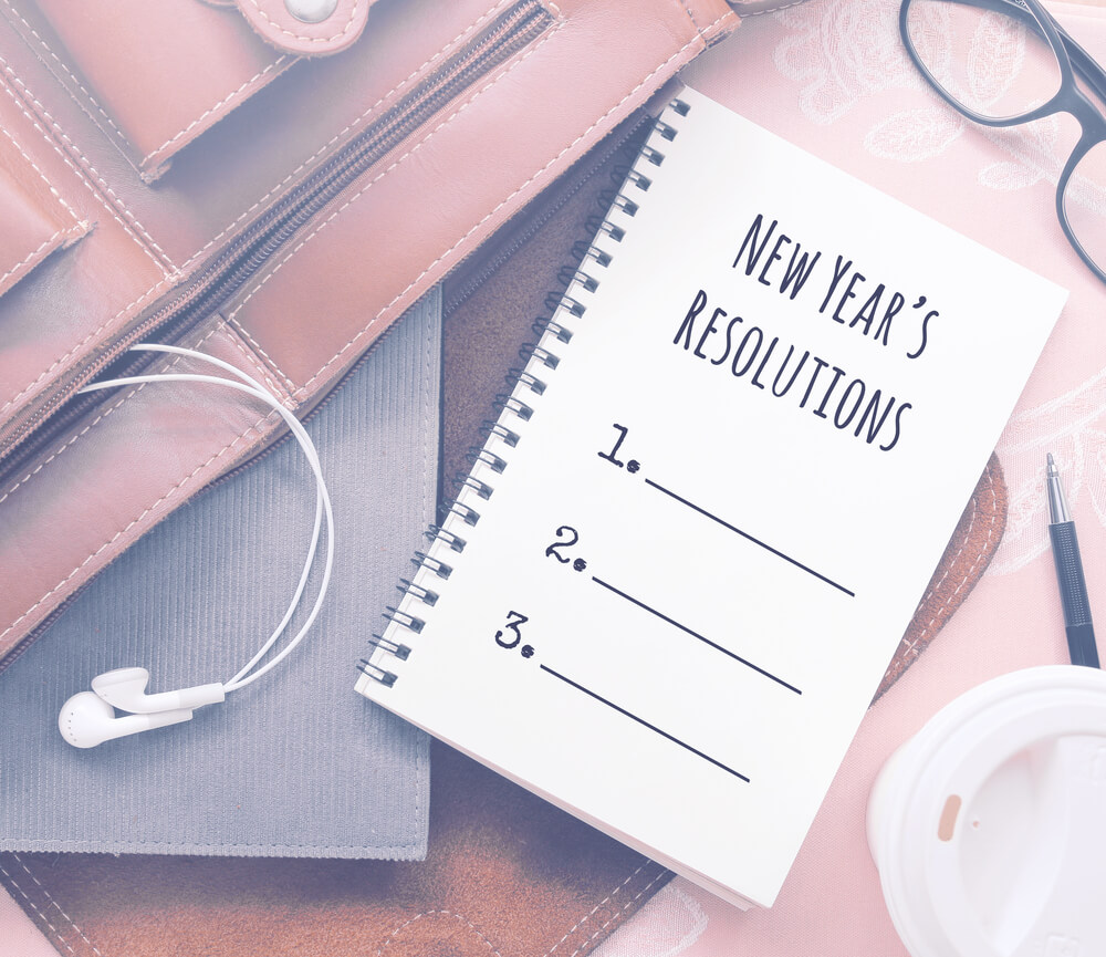 Inspirational motivating quote on notebook with vintage filter